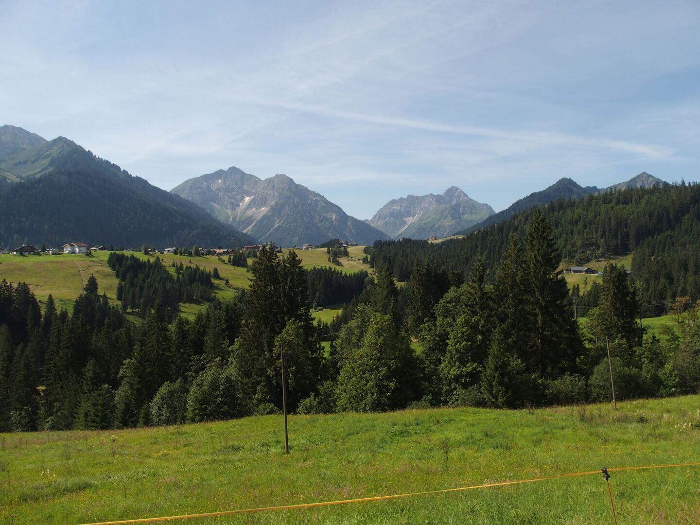 Hiking in the Kleinwalsertal on the border between Austria and Germany. The weather forecast predicts 35 degrees and no rain.