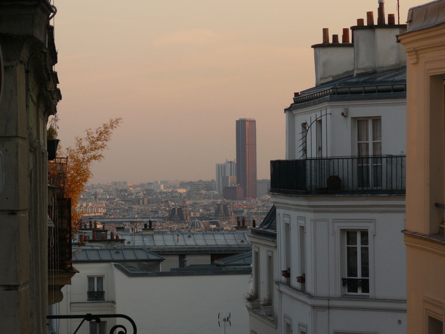 Evening sky over Paris.  Tour Montparnasse is visible in the distance.