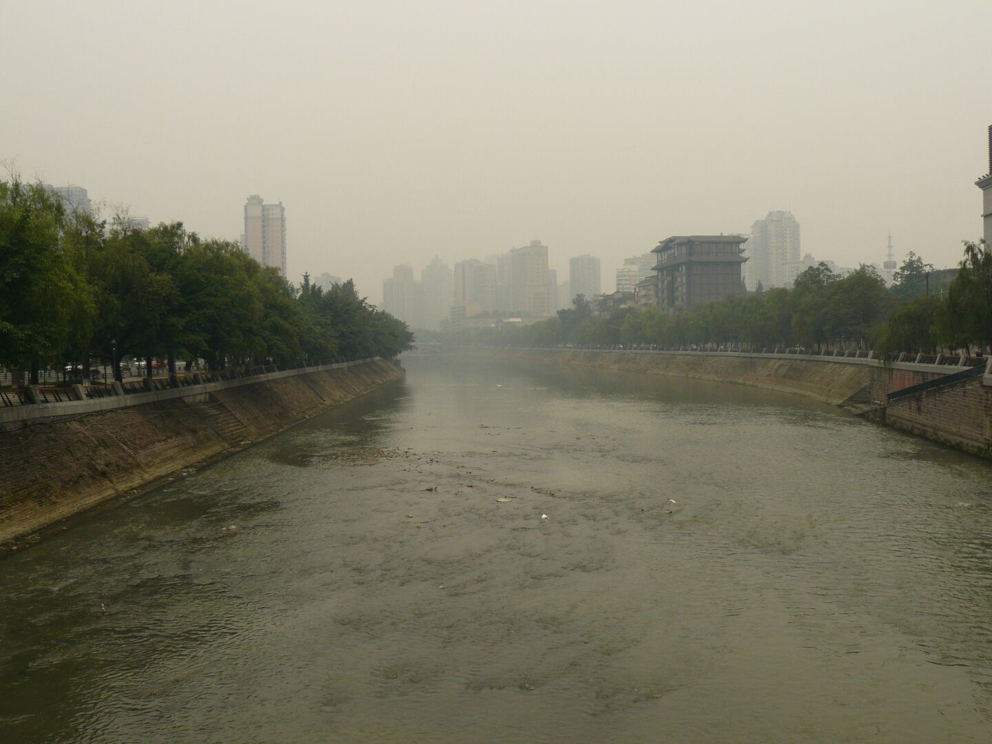 This is the Jinjiang River, which was described as wonderful and beautiful on one of the few English signs... that must have been in a different universe.